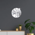 Detail of a basketball acrylic mirror wall sticker on a dark modern living room wall - Silver