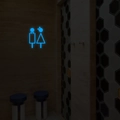 Lichtgevend blauw LED-badkamerbord met iconen op donkere zeshoekige wanddecoratie - Blauw