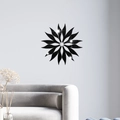 Dettaglio di adesivi murali a specchio girasole in acrilico nero su una parete moderna - Stile Nero (JM3465)