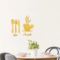 Detail of golden mirror acrylic wall stickers featuring Eat Drink text and cutlery icons - Gold