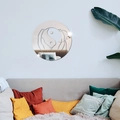 Detailed view of Yin Yang mirror wall decal above colorful pillows in a minimalist room - Silver