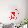 Dettaglio dell'adesivo murale 3D in acrilico rosso con cuore e sagoma di bici - Rosso