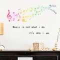 Detail von Musik-Wandaufklebern mit Noten und dem Spruch Music is who I am - Musiknote (PH-QT699)