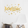 Dettaglio dell'adesivo murale Welcome in acrilico a specchio dorato con stelle decorative - Oro