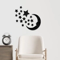 Detail von schwarzen Acryl-Mond und Sternen Spiegel-Wandstickern an einer weißen Wand - Schwarz (JM5030)