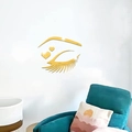Detailansicht der goldfarbenen Wimpern-Spiegelwandaufkleber mit Herzmotiven im Raum - Gold