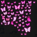 Leuchtende rosa und lila Schmetterling Wandaufkleber die im Dunkeln hell erstrahlen - Fluoreszierendes Rosa