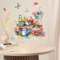Adesivi murali acquerello con fiori, annaffiatoio e farfalle su sfondo beige interno - Stile Floreale ad Acquerello e Annaffiatoio Blu (PH_QTB82)