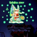 Adesivi murali natalizi luminosi con Babbo Natale su monopattino e fiocchi di neve lucenti - Verde