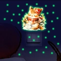 Luminous wall sticker featuring a cute orange cat in winter hat hugging a snowman - Yg_b071 Green Light
