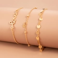 Set di tre cavigliere dorate con scritta Love, ciondolo a stella e paillettes rotonde - Collezione Love Art Oro KC (2790)