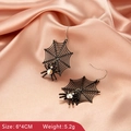 Detail view of spider web earrings with iridescent rhinestones and size measurements - Spider Web Style