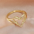 Anillo de corazón ajustable en oro con diseño minimalista de hilo de metal trenzado - Abierto Ajustable / Corazón Envuelto en Hilo Dorado (03 Oro Cobre DZ-883) / Dorado