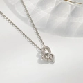 Silver-toned double heart necklace with zircon inlay and polished inner heart finish - Silver Double Heart