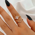 Elegant gold-plated ring set with square zircon and V-shaped band on model's hand - Square White Rhinestone Style (G-405) / Two-Piece Set / KC Gold