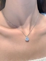 Elegant silver six-prong necklace with a sparkling round zircon pendant on a model neck - White 5694 (Floral Style)