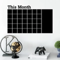 Detailansicht eines mattschwarzen PVC-Monatskalender-Wandtattoos für die Büroplanung - Tafel-Stil / Schwarz