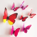 Set mit 7 3D-Schmetterling-Wandtattoos in Rot und Rosa mit lebhaften Flügelmustern - Magnet Magenta Mehrfarbig