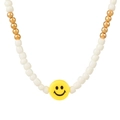 Handmade beaded eyewear chain with white pearls gold beads and a yellow smiley face charm - Gold And White Smiley Style