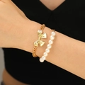 Elegantes zweilagiges Goldarmband mit Perlen und Schleifenanhänger für Damen im Set - Gold Künstliche Perle Schleife (Armband)(3076)