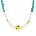 Handmade beaded glasses chain with green beads and yellow smiley face charm - Green And White Smiley Style
