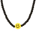 Handmade beaded glasses chain with black cylindrical beads and yellow smiley face charm - Black Beads Smiley Style