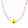 Pink beaded glasses chain with a yellow smiley face pendant in a vibrant fashion style - Pink Beads Smiley Style