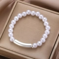 Minimalist baroque pearl bracelet with elegant curved metallic tube on a gold display box - Minimalist Metal Tube Style / Bright Silver (6930)