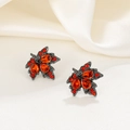 Pendientes de hoja de arce vintage con cristales rojos en acabado gris plomo - Estilo Arce con Strass Rojo Negro Fusil (10476)