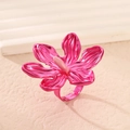 Macro shot of rose purple metallic flower ring showing leaf texture and open band design - Rose Red Ring