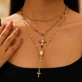 Gold multi-layer necklace with vintage cross pendants and colorful beads on model - KC Gold (A-537)
