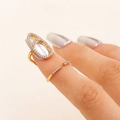 Gold fingernail ring featuring a white cat-eye stone and sparkling pavé diamonds - Cat's Eye Zirconia (4498) / KC Gold