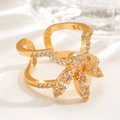 Gold bow-shaped adjustable nail ring featuring micro-pave sparkling crystals - Bowknot Open Ring (X231) / KC Gold