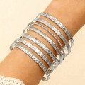Set of eight vintage silver-finished cuff bracelets with engraved heart and twist patterns - 8 Pieces Collection (3321)