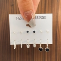 Lot de 6 paires de boucles d'oreilles argentées en acétate avec étoiles et cœurs noirs - 24 Blanc K 9342