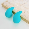 Minimalist matte turquoise teardrop earrings placed on natural travertine stone - Mint Blue