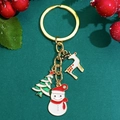 Detailed view of Christmas keychain with snowman, tree and reindeer charms on gold hardware - Snowman And White Reindeer Style (9597) / KC Gold