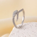 Silver snake wrap ring featuring micro-paved cubic zirconia and detailed scale texture - White Gold