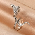 Vintage silver snake ring with cubic zirconia scales on luxurious champagne satin - Antique Silver