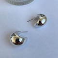 Polished silver-tone punk style teardrop C-shape earrings with a smooth mirror finish - White K N-502