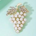 Elegant grape cluster brooch with white pearls and sparkling crystals in gold finish - Pearl Grapes