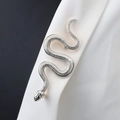 Elegant silver snake brooch with detailed scale texture on white blazer lapel - Silver Snake Dangle