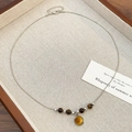 Brown leather choker with starburst pendant and tiger eye beads in a wooden tray - Multi-Artificial Pearl Necklace (02 White K Multi-Artificial Pearl DZ-746) / Silver