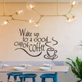 Detailed wall decal showing Wake up to a GOOD cup of COFFEE lettering in a cafe setting - Black