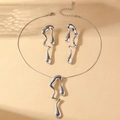 Modern silver liquid metal jewelry set featuring irregular dripping pendant and stud earrings - Silver Jewelry Set