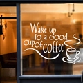 Macro shot of Wake up to a GOOD cup of coffee vinyl decal on cafe window glass - White
