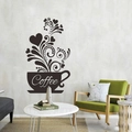Detalle de un vinilo decorativo de taza de café con vapor en forma de corazón en la pared - Negro