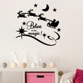 Weihnachtswandtattoo mit Weihnachtsmann-Schlitten und Spruch Believe in the magic - Schwarz