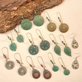 Collection de boucles d'oreilles vintage en bronze avec motifs mandala et feuilles - Lot de 9 Paires de Boucles d'Oreilles