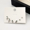 Set di sei orecchini a serpente argentati e perni rotondi con zirconi e piccoli occhi verdi - Set di Orecchini a Serpente Zirconia (0329)